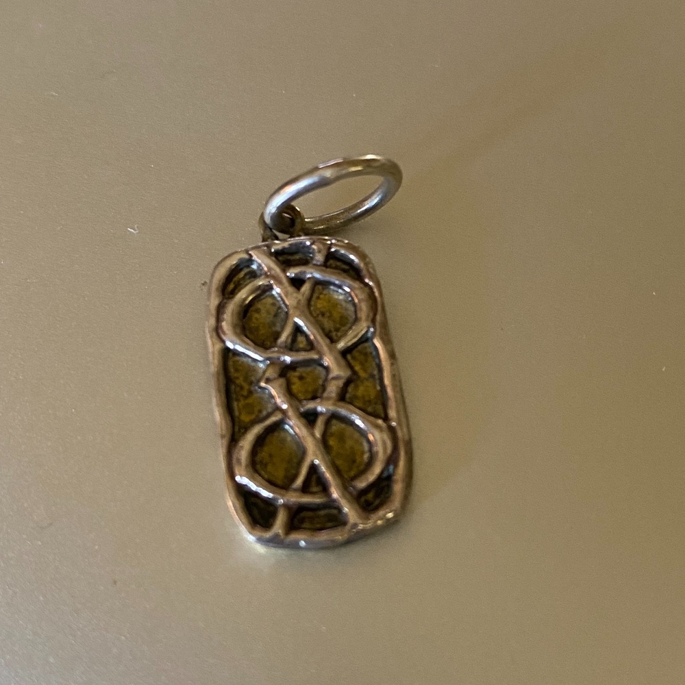 Waxing Poetic XO Charm. Brass and Silver